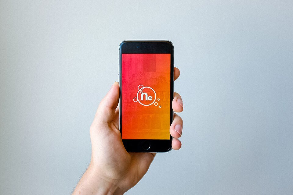 A smartphone held in a hand