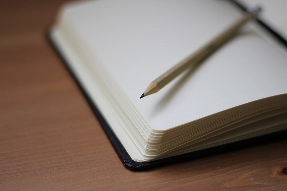 A notebook on a working table